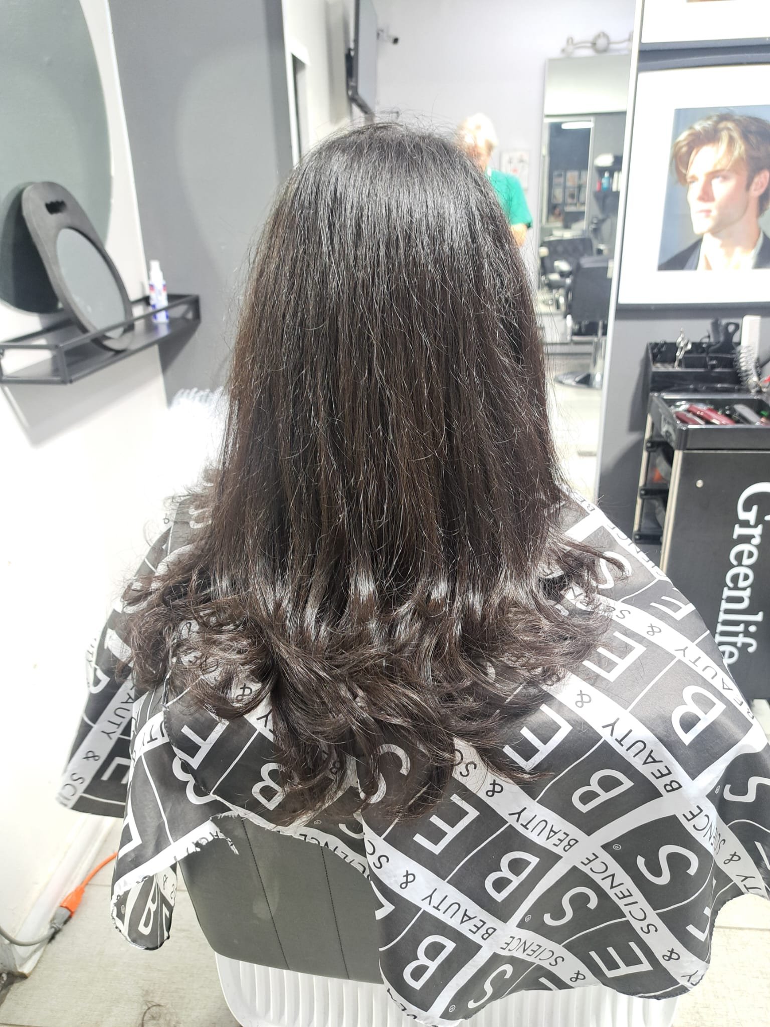 Long brunette haircut with soft layered ends by Konstantin Stylist