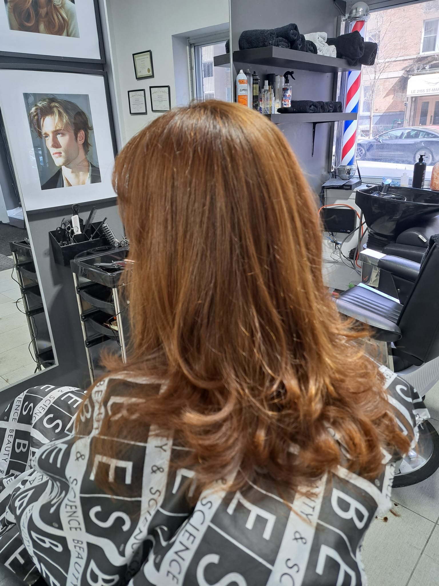 Copper-brown layered haircut and polished styling by Konstantin Stylist